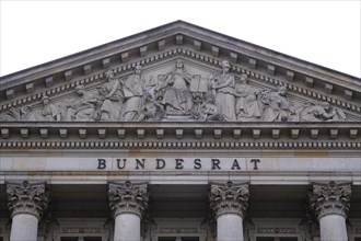 Lettering and relief in the tympanum above the main portal of the Bundesrat, Berlin, Germany,