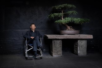 Elderly Chinese man in a wheelchair, Chengdu, China, Asia