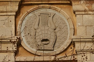 Architectural detail of a stone relief in the shape of a harp, Old Town of Rhodes, Rhodes Town,