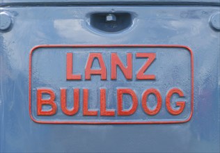 Lanz Buldog lettering, red on blue painted tractor bonnet, Offenbach, Dreieich, Hesse, Germany,