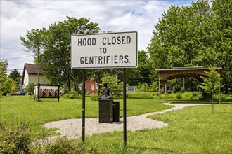 Detroit, Michigan, An anti-gentrification sign posted in the East Canfield Art Park in the East