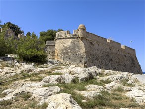 Fortress wall with one of 10 ten watchtowers on east side of fortress ruins of historic fortress