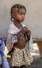 Hakaona girl with traditional hair jewellery, Angolan tribe of the Hakaona, near Opuwo, Kunene,