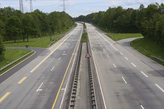 Trucks with a total weight of 960 tonnes stand on the Moselle valley bridge in Winningen during a