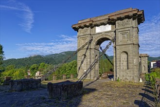 The historic Ponte delle Catene bridge over the River Lima in Bagni di Lucca in the district of