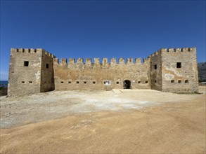 Exterior view with two corner towers walls battlements entrance of Fort Fortezza Fortetza