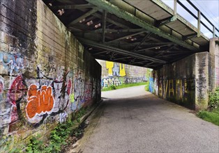 Bridge subway with graffiti, Phoenix Park, path to the Hympendahl slag heap, Hoerde, Dortmund, Ruhr