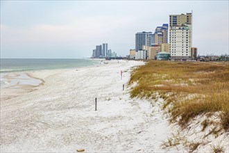 Hotels and condominium buildings along the shoreline of the beach on the Gulf of Mexico at Gulf