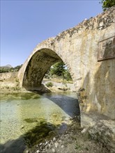 Historic classical stone arch bridge in Venetian architectural style Venetian Great Old Bridge 19th