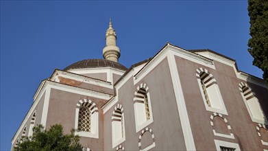 Suleiman Mosque, Mosque with dome and decorative windows in a traditional architectural style under