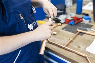 Work on a copper pipe, taken during a visit to the Berliner Wasserbetriebe training centre in