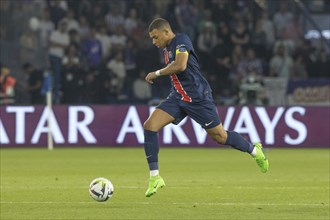 Football match, captain Kylian MBAPPE' Paris St. Germain running with the ball to the left, Parc