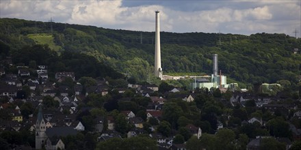 Sunlit Cuno power station with 248 metre high chimney, Herdecke, North Rhine-Westphalia, Germany,