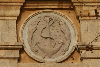 Architectural detail of a stone relief in the shape of an anchor, Old Town of Rhodes, Rhodes Town,