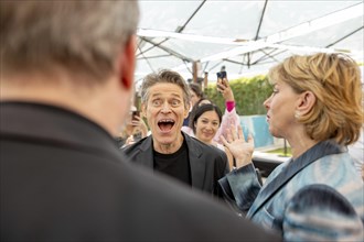 Cannes, France, 19.5.2024: Willem Dafoe and Sharon Waxman in front of talking about the new film