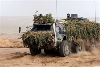 German soldiers on a Fuchs armoured transport vehicle, taken during the NATO Steadfast Defender