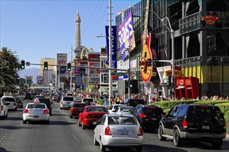 Las Vegas, Nevada, USA, North America, A busy street with lots of cars and people, an Eiffel Tower