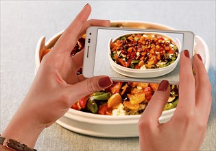 Photographing the food with your mobile phone