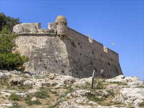 Fortress wall with one of 10 ten watchtowers on east side of fortress ruins of historic fortress