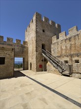 View from inner courtyard to corner tower with staircase entrance of Fort Fortezza Fortetza