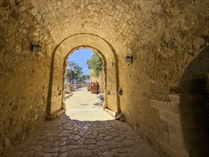 View through main entrance Tor tor to ruins of historical fortress Fortetza Fortezza of Rethymno