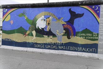 Graffiti on the Berlin Wall in the East Side Gallery, Berlin, Germany, Europe, Cheerful wall art