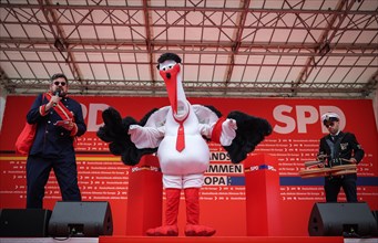 SPD rally for the European elections. Stork figure of the satirical campaign -Stork Heinar- under