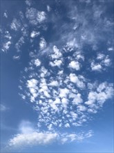 Clouds Altocumulus fleecy clouds in front of blue sky, international