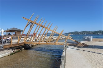 Modern wooden bridge on the beach Plage de Port Grimaud, Port Grimaud, Var, Provence-Alpes-Cote d