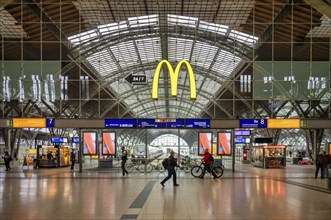 McDonalds, promenades, shops, retail, station building, logo, travellers, passers-by, main station,