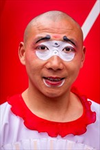 Chinese man with face painting, Chengdu, China, Asia