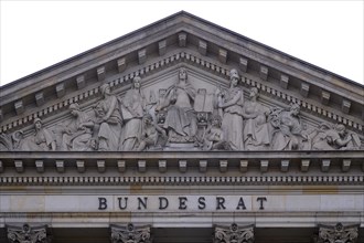 Lettering and relief in the tympanum above the main portal of the Bundesrat, Berlin, Germany,