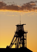 Tomson-buck headframe at atmospheric sunrise, former Gneisenau colliery, Dortmund, North
