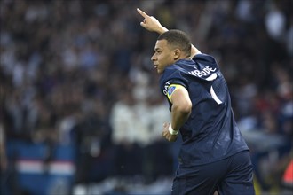 Football match, captain Kylian Mbappe' Paris St Germain has just scored 1-0 for Paris St Germain,