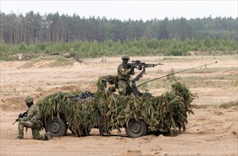Dutch soldiers on a camouflaged Mercedes G280 CDI during the NATO Steadfast Defender large-scale