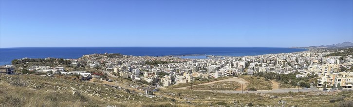 Panoramic photo overview from elevated position on the city of Rethymno left behind fortress