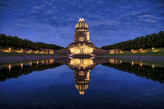 Monument to the Battle of the Nations, illuminated, evening mood, reflection in the lake, blue