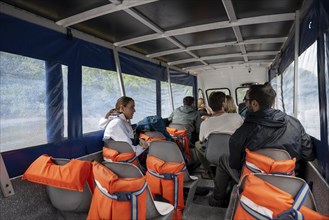 Tourists on a taxi boat, Corcovado National Park, Costa Rica, Central America