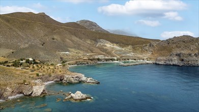 Aerial view from elevated position on left small hidden beach Loutra Beach on south coast of Crete