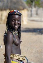 Hakaona girl with traditional kapapo hairstyle, portrait, Angolan tribe of the Hakaona, near Opuwo,