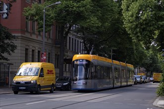 Tram, delivery vehicle, DHL delivery service, logo, Leipzig, Saxony, Germany, Europe