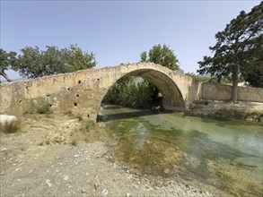 Historic classical stone arch bridge in Venetian architectural style Venetian Great Old Bridge 19th