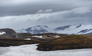 Volcanic landscape with hills and snow, Laugavegur trekking trail, Landmannalaugar, Fjallabak