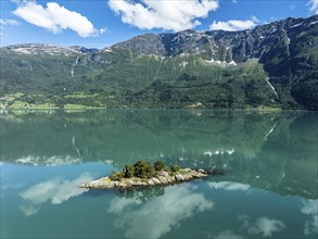 Aerial view over the Lustrafjord, the inner branch of the Sognefjord, island with trees, near