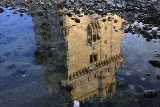 Belem Tower, in Lisbon, Portugal, reflected on Tagus river, Europe