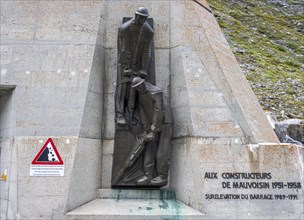 Monument in memory of workers who build the hydroelectric water dam at Lake Mauvoisin, Switzerland,