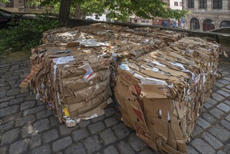 Collected waste paper tied together in cubes, Nuremberg, Central Franconia, Bavaria, Germany,