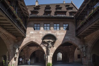 Inner courtyard of the historic Heilig-Geist-Spital, Nuremberg, Middle Franconia, Bavaria, Germany,