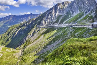 Right gallery with modern route road from for south ramp of pass summit Gotthardpass Alpine pass