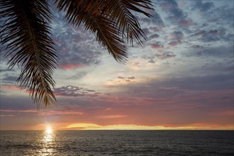 Famous Puerto Vallarta sunsets on sea promenade, El Malecon, with ocean lookouts, beaches, scenic